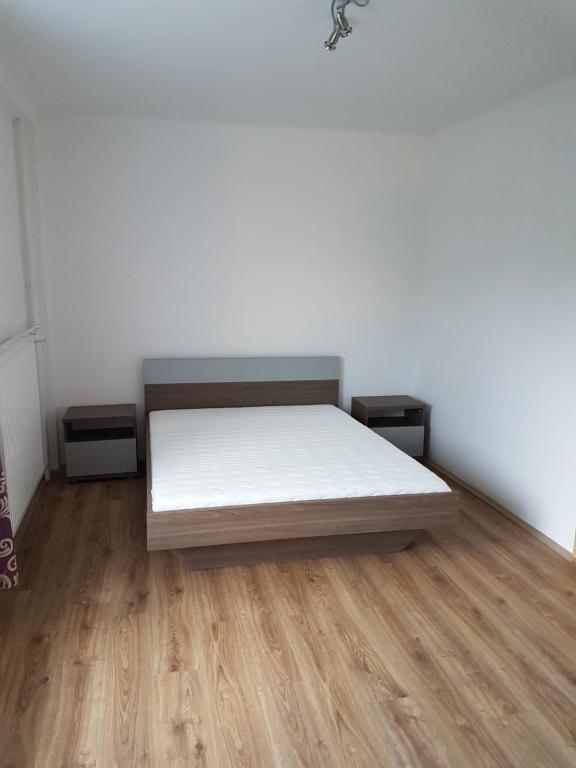 Postel nebo postele na pokoji v ubytování Beno apartmanok