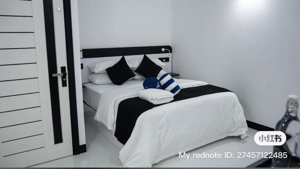 Ένα ή περισσότερα κρεβάτια σε δωμάτιο στο Alyraa sunset