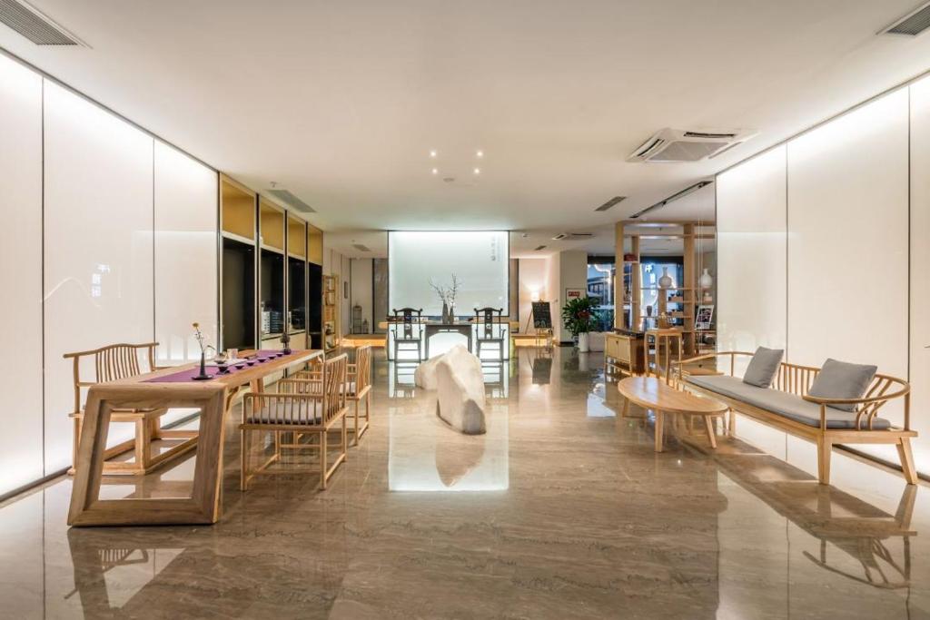 Χώρος καθιστικού στο The Hidden House Cheng Du Du Fu Thatched Cottàge Branch