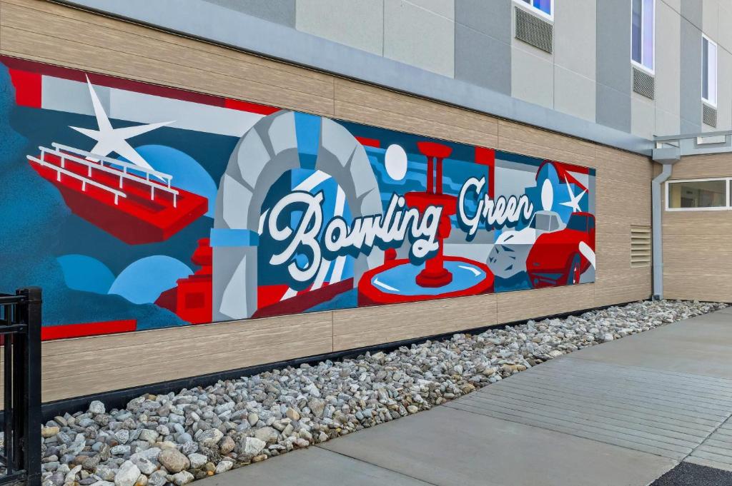 a mural on the side of a building at Everhome Suites Bowling Green by Choice Hotels in Bowling Green