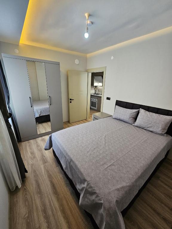 En eller flere senge i et værelse på Yaşam Apart