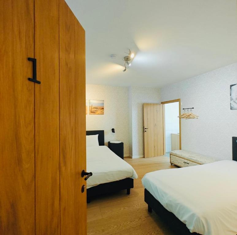 Postel nebo postele na pokoji v ubytování Logies-Bistro Rosa