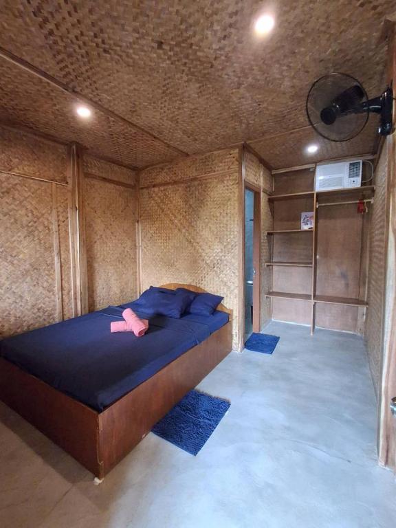 Ένα ή περισσότερα κρεβάτια σε δωμάτιο στο Gandya Residence