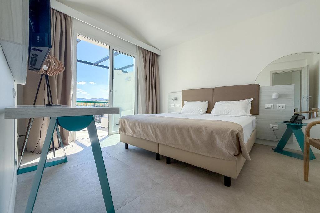 Postel nebo postele na pokoji v ubytování Hotel Torre Normanna