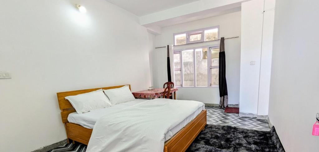 Ένα ή περισσότερα κρεβάτια σε δωμάτιο στο Accomoon hotels