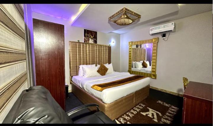 Ένα ή περισσότερα κρεβάτια σε δωμάτιο στο hotels connect