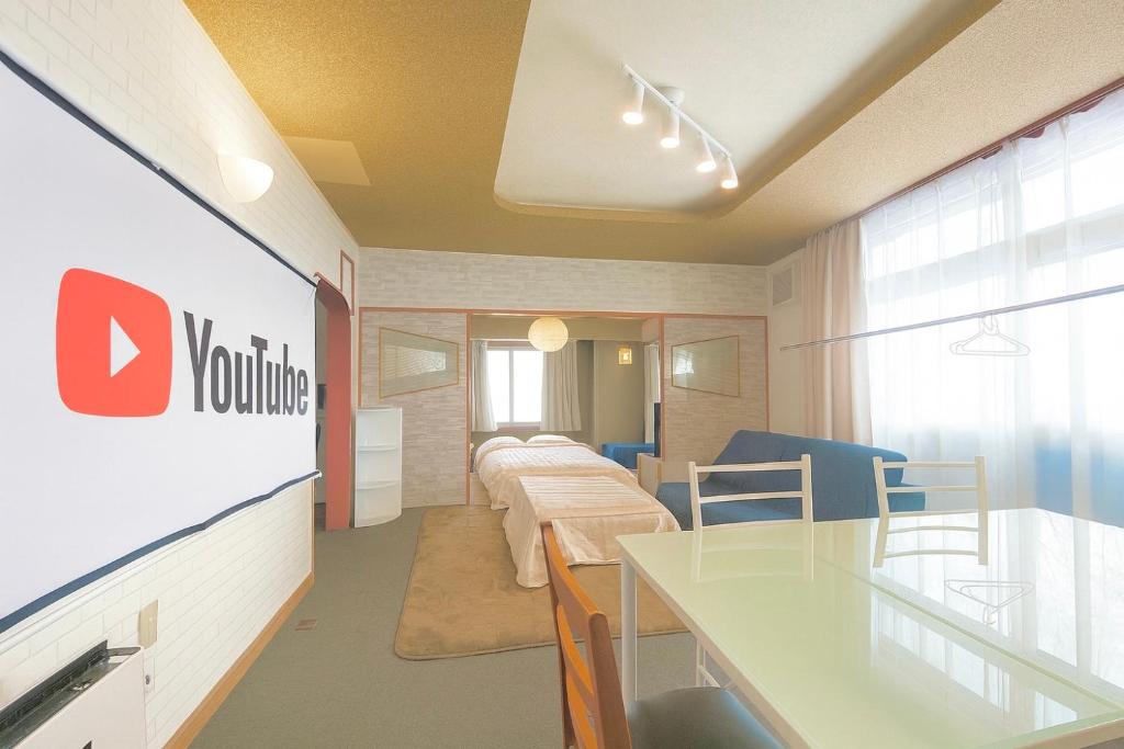 a hospital room with two beds in a room at 優中富良野 in Nakafurano