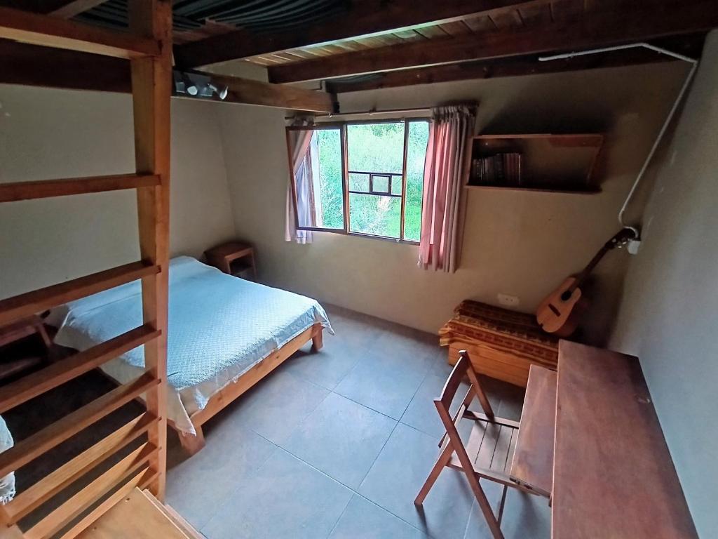 En eller flere senge i et værelse på Atelier del Monte