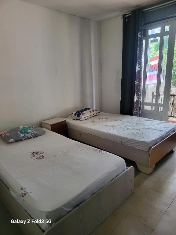 Postel nebo postele na pokoji v ubytování Lakaz