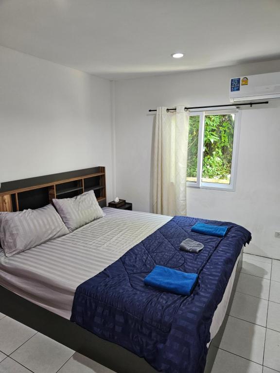 Ένα ή περισσότερα κρεβάτια σε δωμάτιο στο Bestin Karon 2