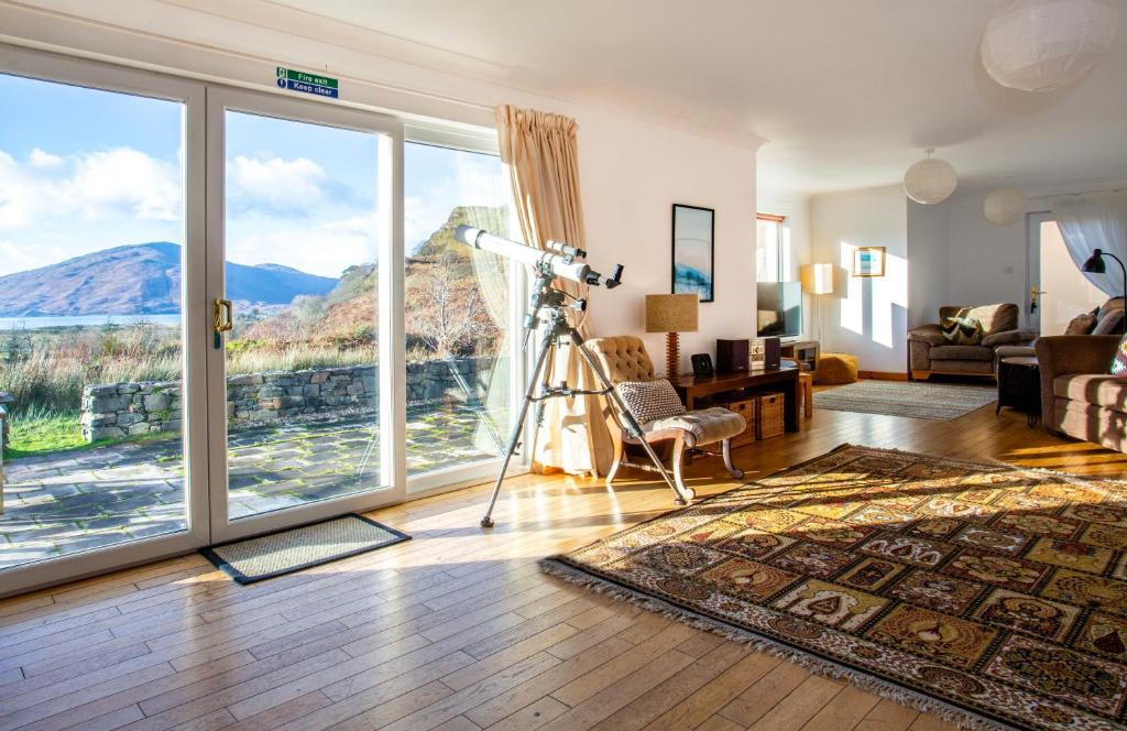 a living room with a view of a mountain at Skye View in Glenelg