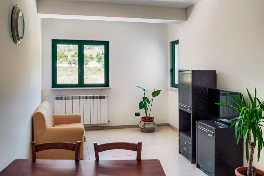 TV a/nebo společenská místnost v ubytování Agriturismo Statale 17