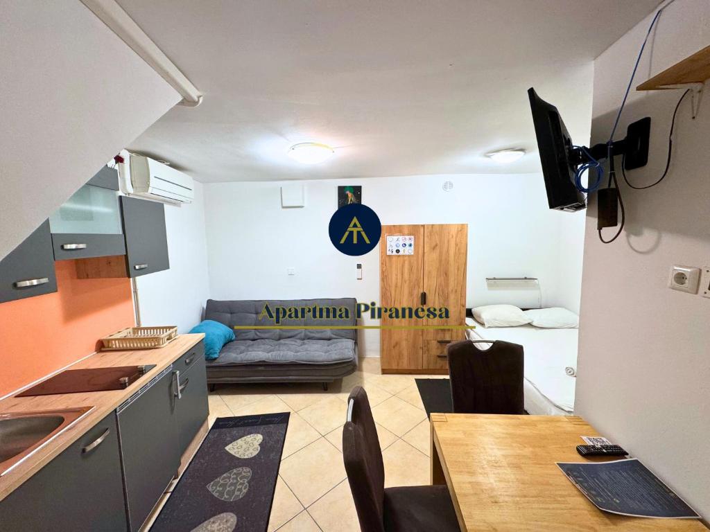 Kuchyň nebo kuchyňský kout v ubytování Apartma Piranesa III