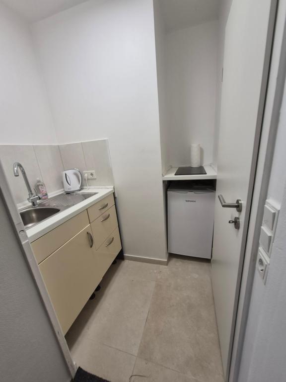 Kuchyň nebo kuchyňský kout v ubytování Unterkunft SaarGlück