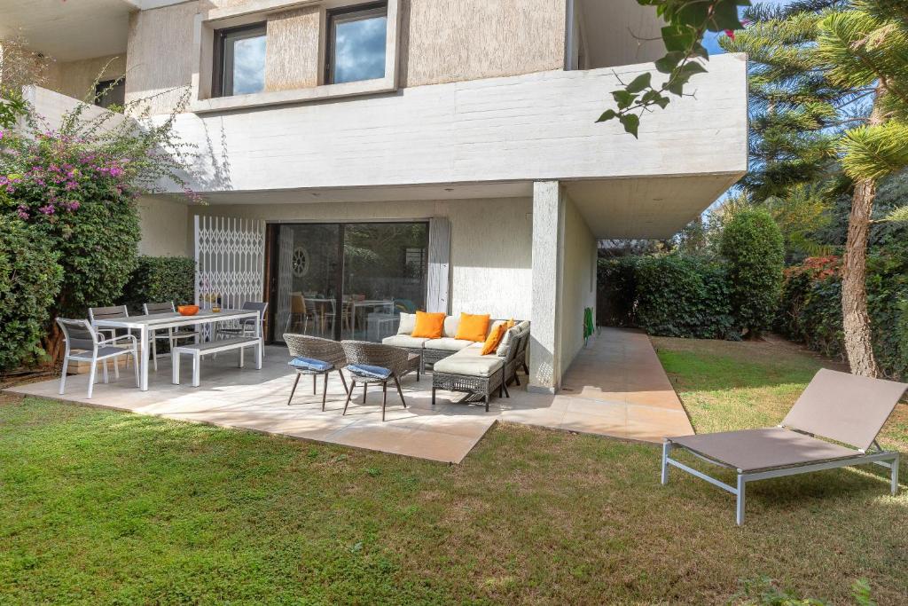 Private Garden Duplex in Voula by GHH