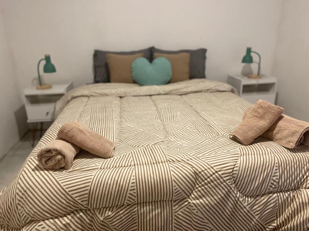 Ένα ή περισσότερα κρεβάτια σε δωμάτιο στο El Refugio