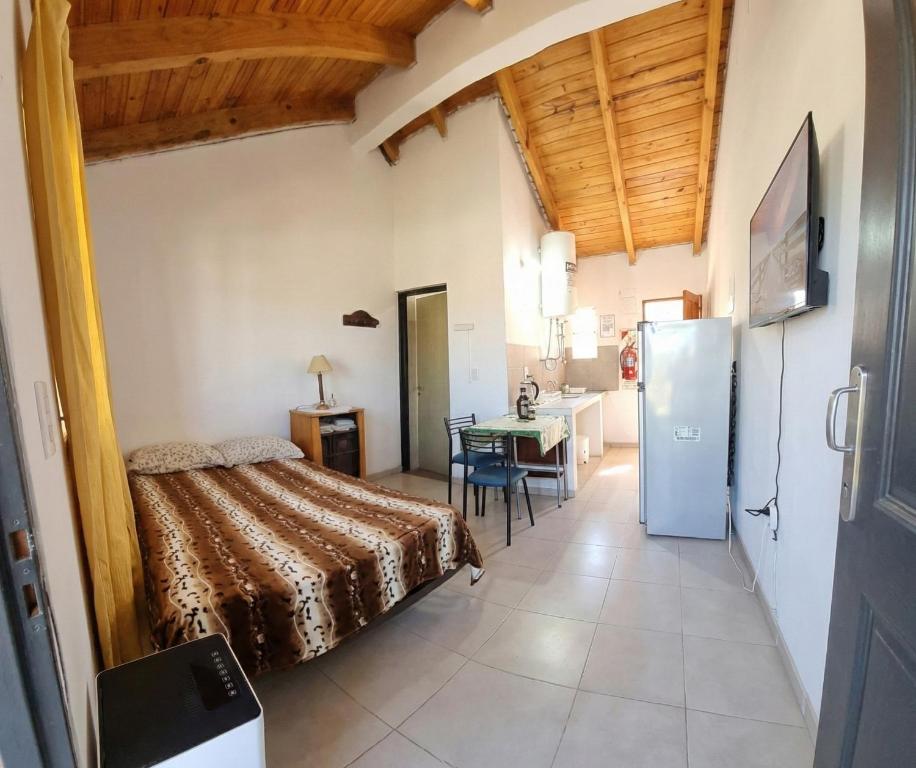 Giường trong phòng chung tại Casa Cafa