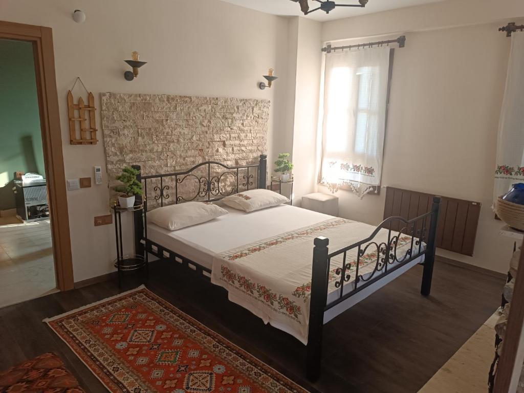 Ένα ή περισσότερα κρεβάτια σε δωμάτιο στο İkiz Konaklar