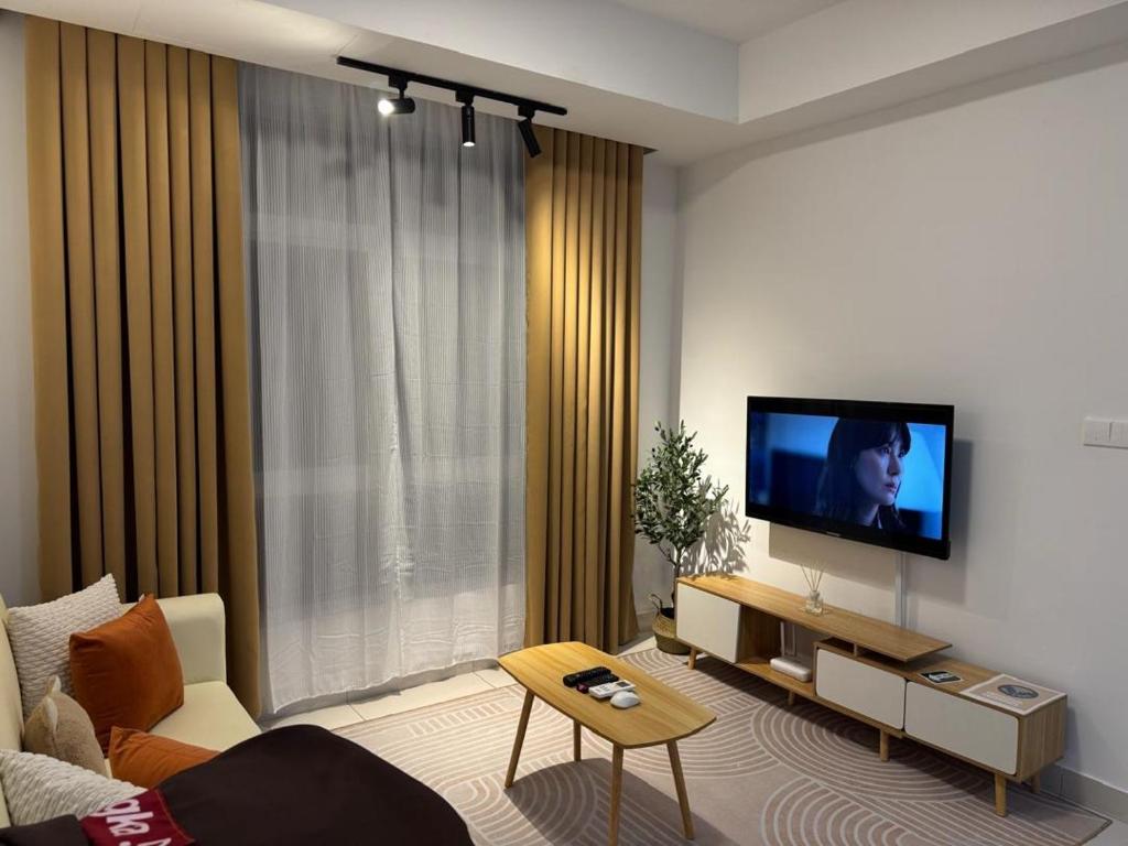 Телевизор и/или развлекательный центр в Mirai Residence Kajang 2 UKM Bangi GMI