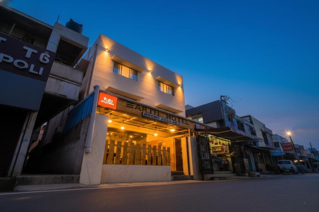 a building on a city street at night at Via Earth- Nr Vadapalani Murugan Temple, Vadapalani in Chennai