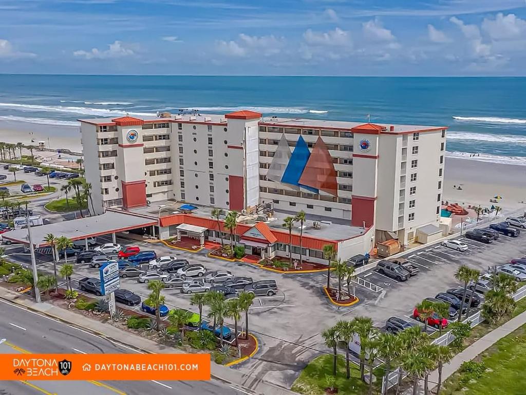 an aerial view of a hotel near the beach at Amazing Studio Steps Away From The Atlantic Ocean! in Daytona Beach