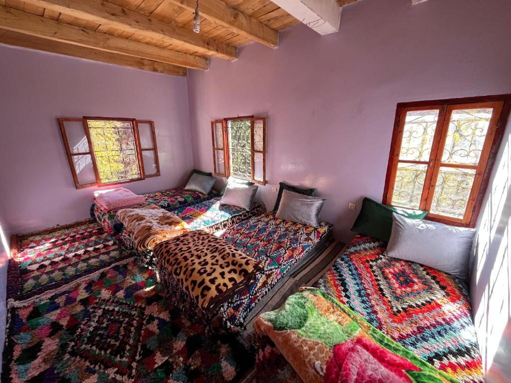 Postel nebo postele na pokoji v ubytování Gite Megdaz Ouhadouch