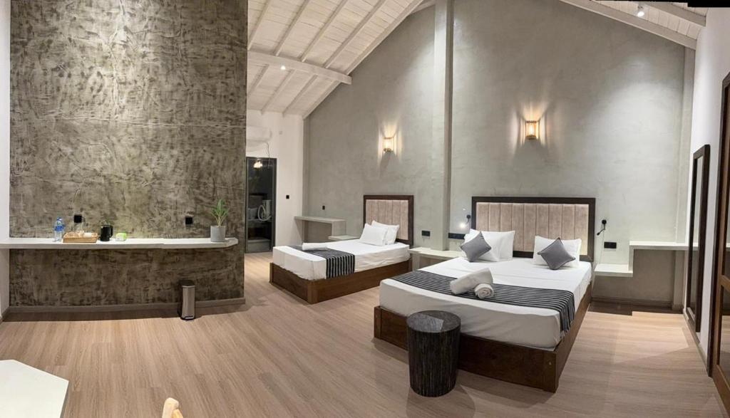 Una cama o camas en una habitación de The Lavish Haven