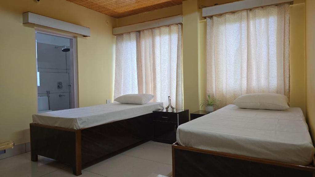 Ένα ή περισσότερα κρεβάτια σε δωμάτιο στο Tapas