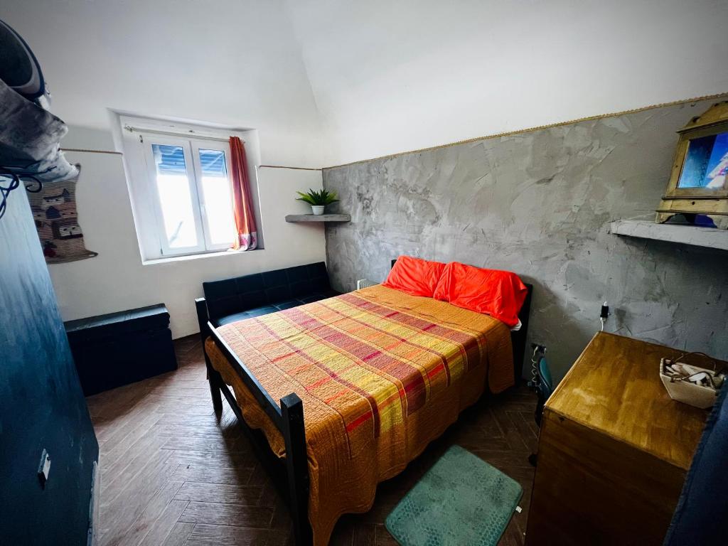 Кровать или кровати в номере Bilocale vista Etna con parcheggio