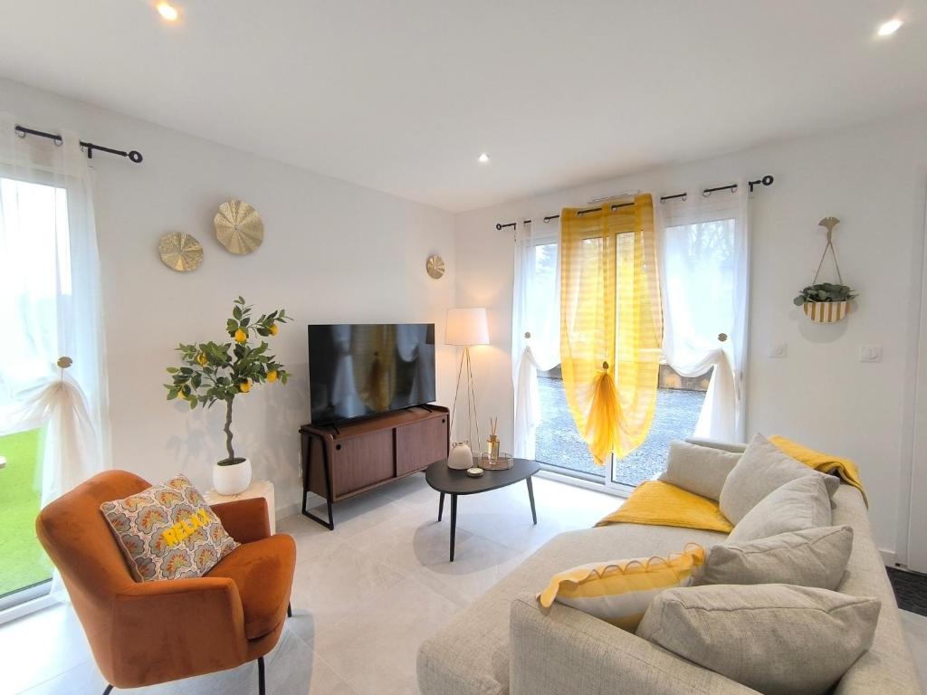 Un lugar para sentarse en Le Zest d'or - Douceur & Lumière à 5min en voiture de la Plage