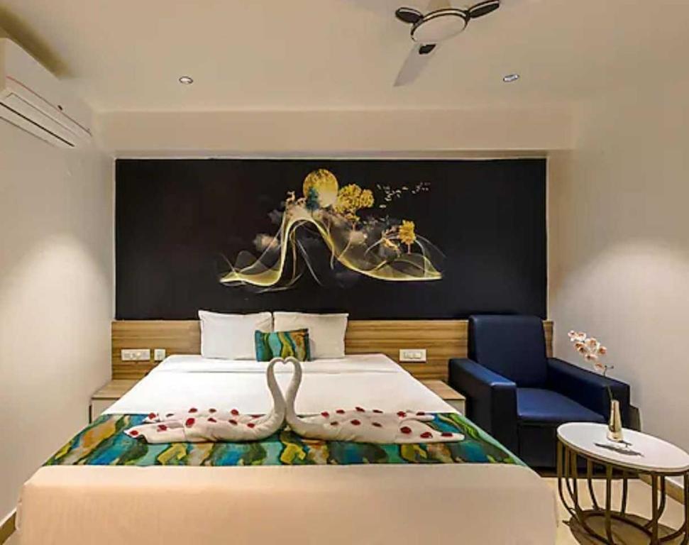 Ένα ή περισσότερα κρεβάτια σε δωμάτιο στο POP 84109D Hotel O Near Jodimetla X Roads