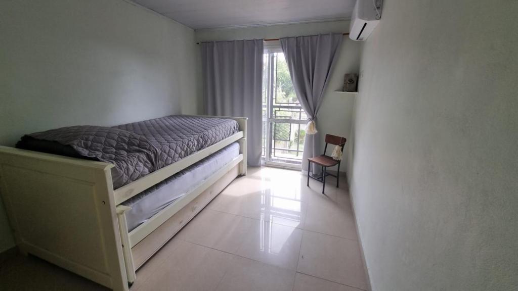 Ένα ή περισσότερα κρεβάτια σε δωμάτιο στο Hornero House