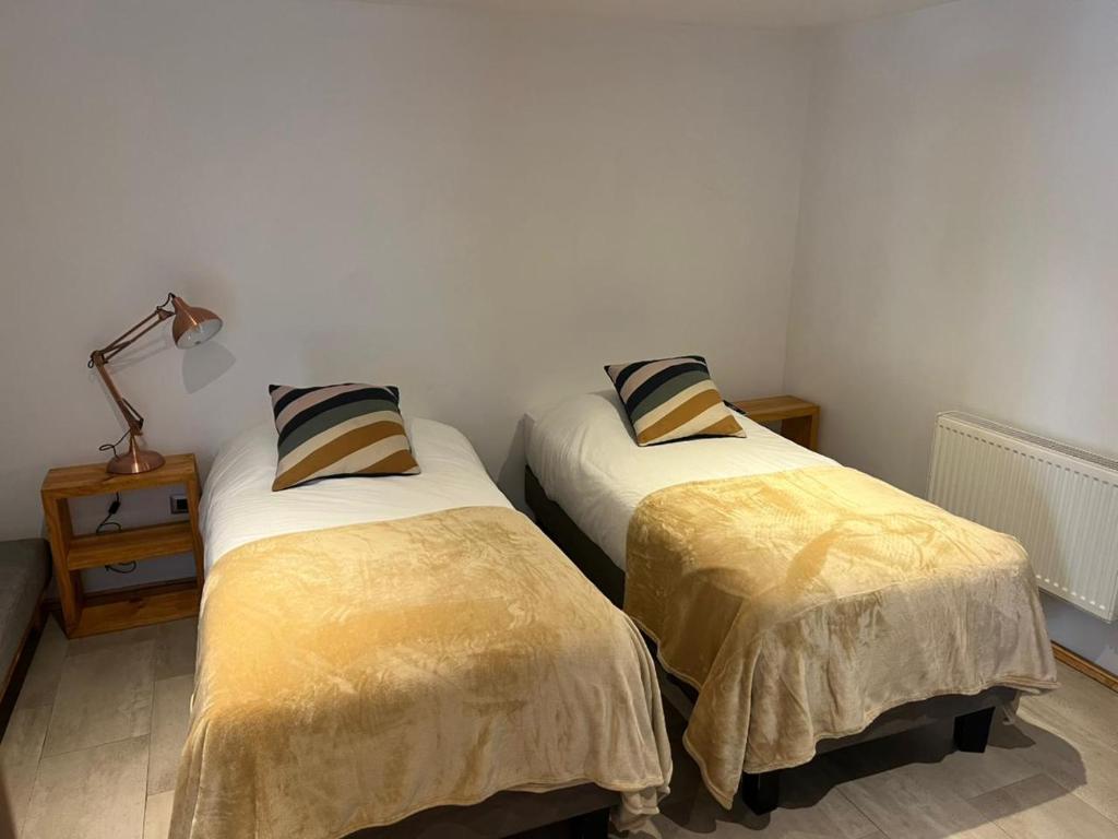 Cama o camas de una habitación en Hotel Casa Surf