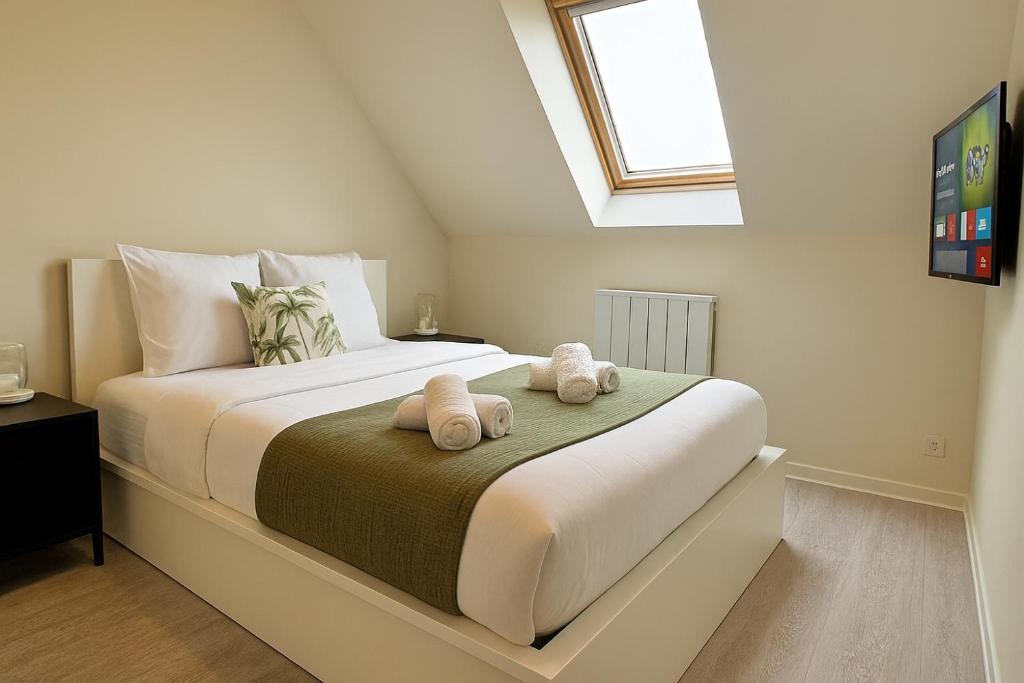 En eller flere senge i et værelse på Luna verde - Parking