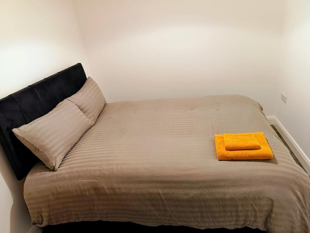 Ένα ή περισσότερα κρεβάτια σε δωμάτιο στο Modern 1 Bedroom Apt 7 near City Centre Parking