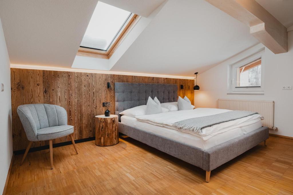 Ένα ή περισσότερα κρεβάτια σε δωμάτιο στο Stoacherhof Apartments