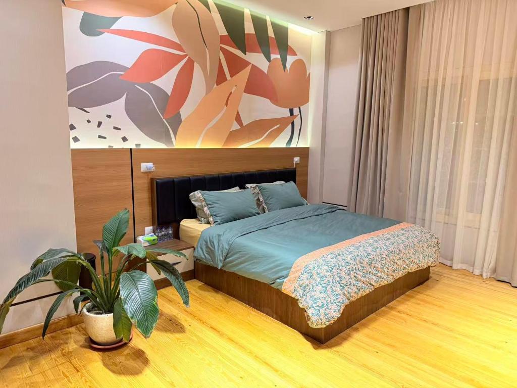 Postel nebo postele na pokoji v ubytování 湖庭 residents