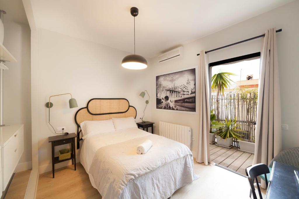 En eller flere senge i et værelse på Alemaison Diseño y Confort Piscina Privada