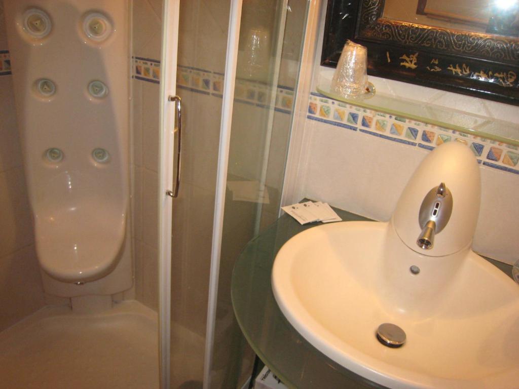 Koupelna v ubytování Apartamentos Grifovacances Tres Estrelles Club