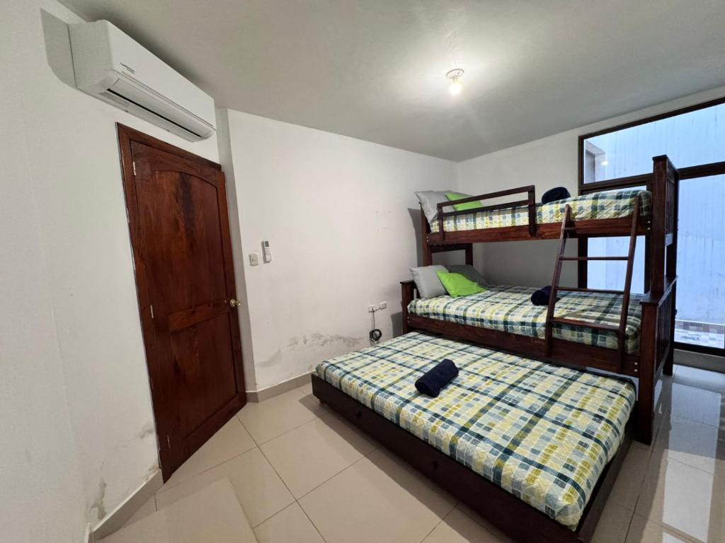 Postel nebo postele na pokoji v ubytování Casa sagrada familia