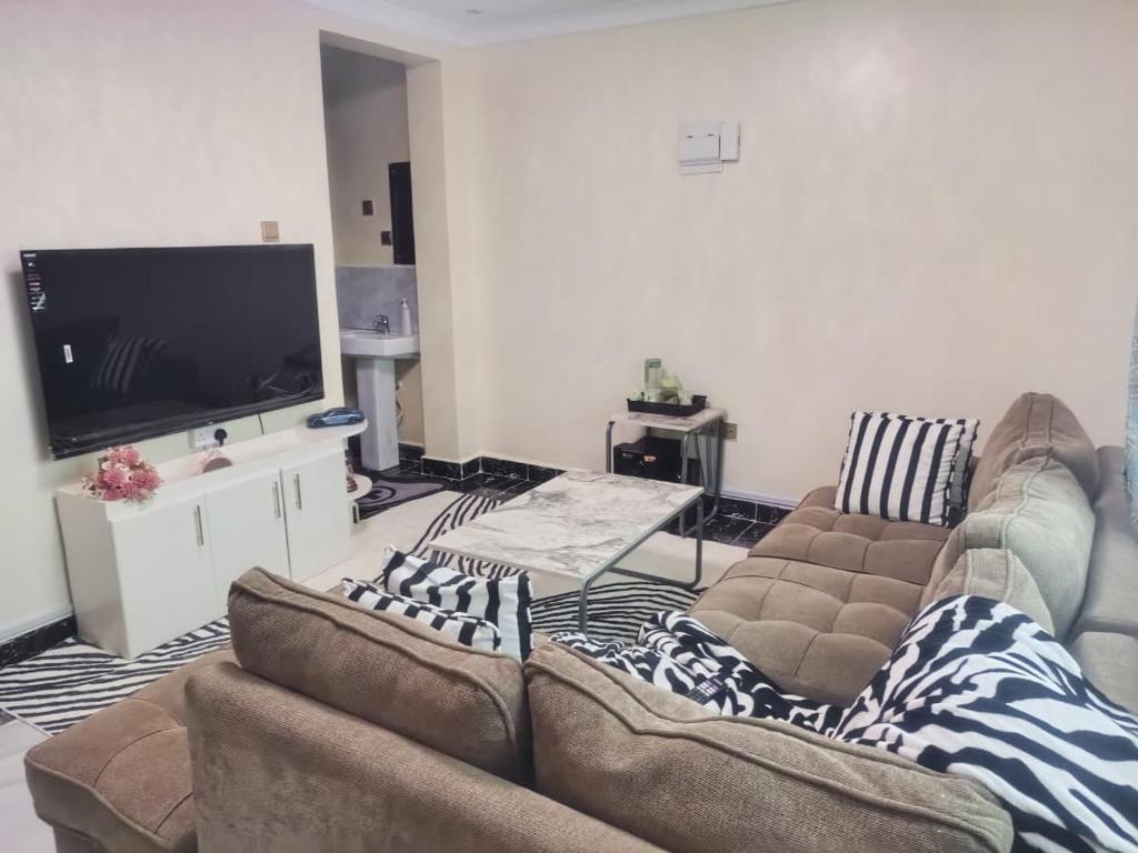 TV/trung tâm giải trí tại Cozy Homes