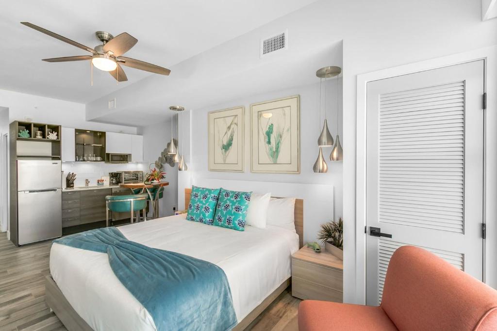 Giường trong phòng chung tại Portside Suite - CC-301A