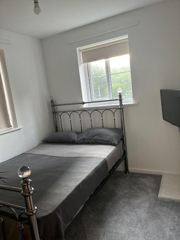 Postel nebo postele na pokoji v ubytování City View Crib