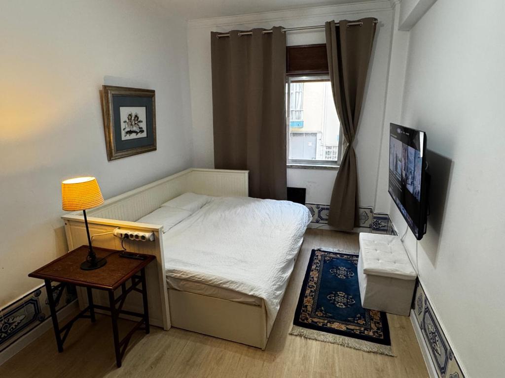 Postel nebo postele na pokoji v ubytování Guest House Monte Abraão