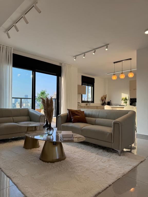 Χώρος καθιστικού στο Sunset Home