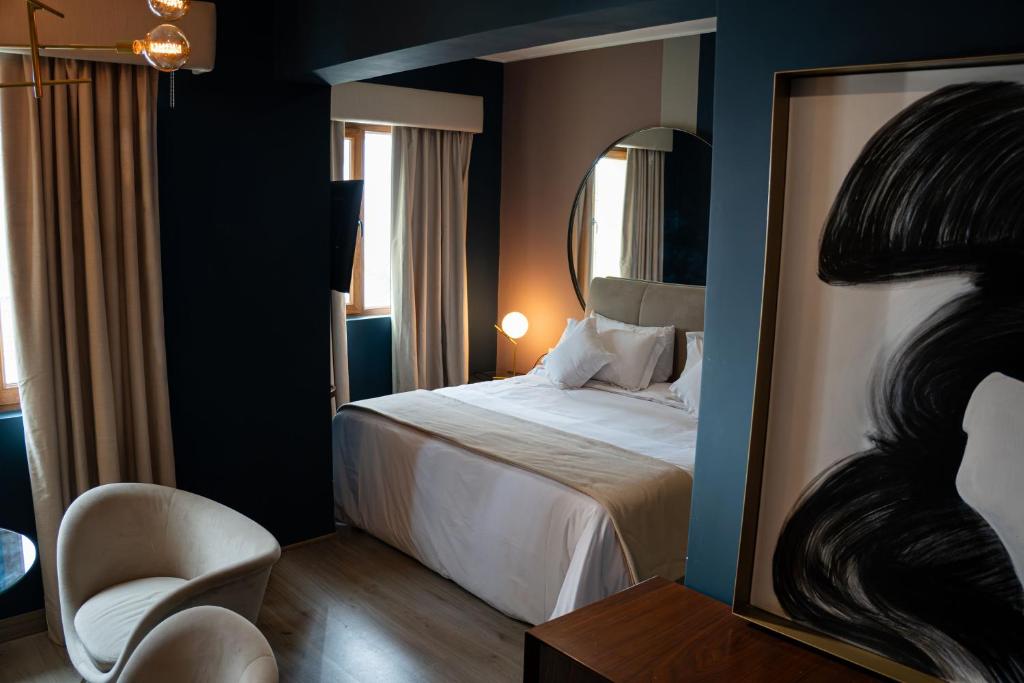 Postel nebo postele na pokoji v ubytování Olivar House Hotel