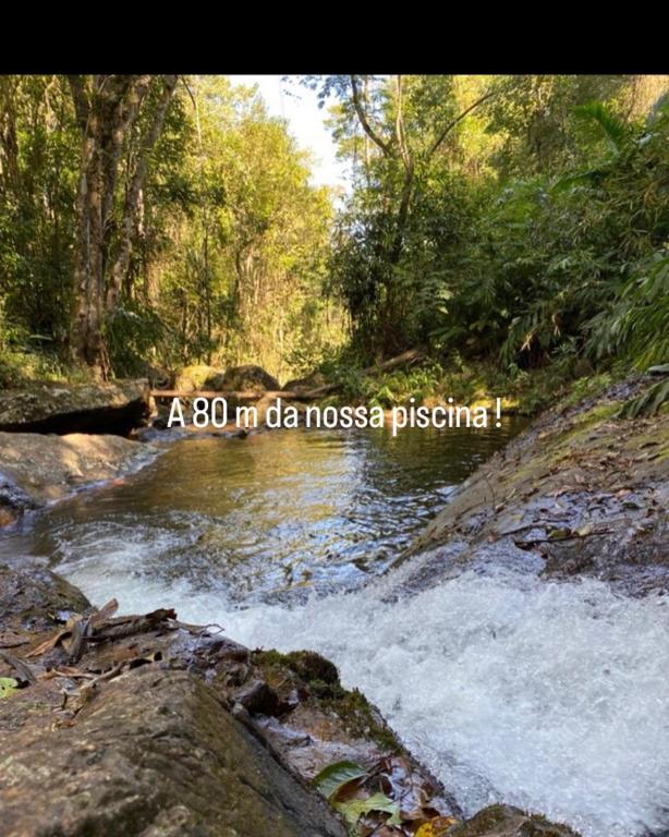 a picture of a river with the words a mi da mososa pasha at Pousada Sítio da Luzia in Engenheiro Passos
