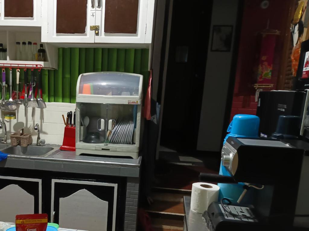 Η κουζίνα ή μικρή κουζίνα στο BDS Yin Yang Transient House