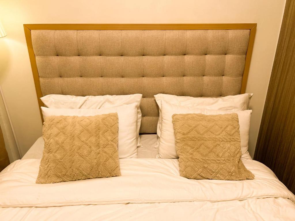 Ένα ή περισσότερα κρεβάτια σε δωμάτιο στο Oasis Suite-Shore 2 Mall of Asia Elegant apartment