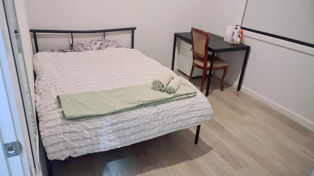 Ένα ή περισσότερα κρεβάτια σε δωμάτιο στο A private room